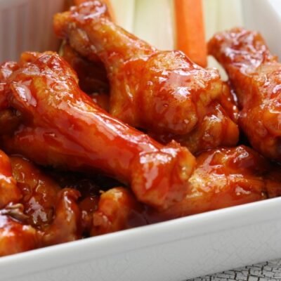 Plain chicken wings, crispy and golden, served fresh at Boston Wings & Pizza in Allston MA