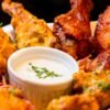 Most popular chicken wing flavors ranked from mild to spicy at 24 Hour Wings in Boston